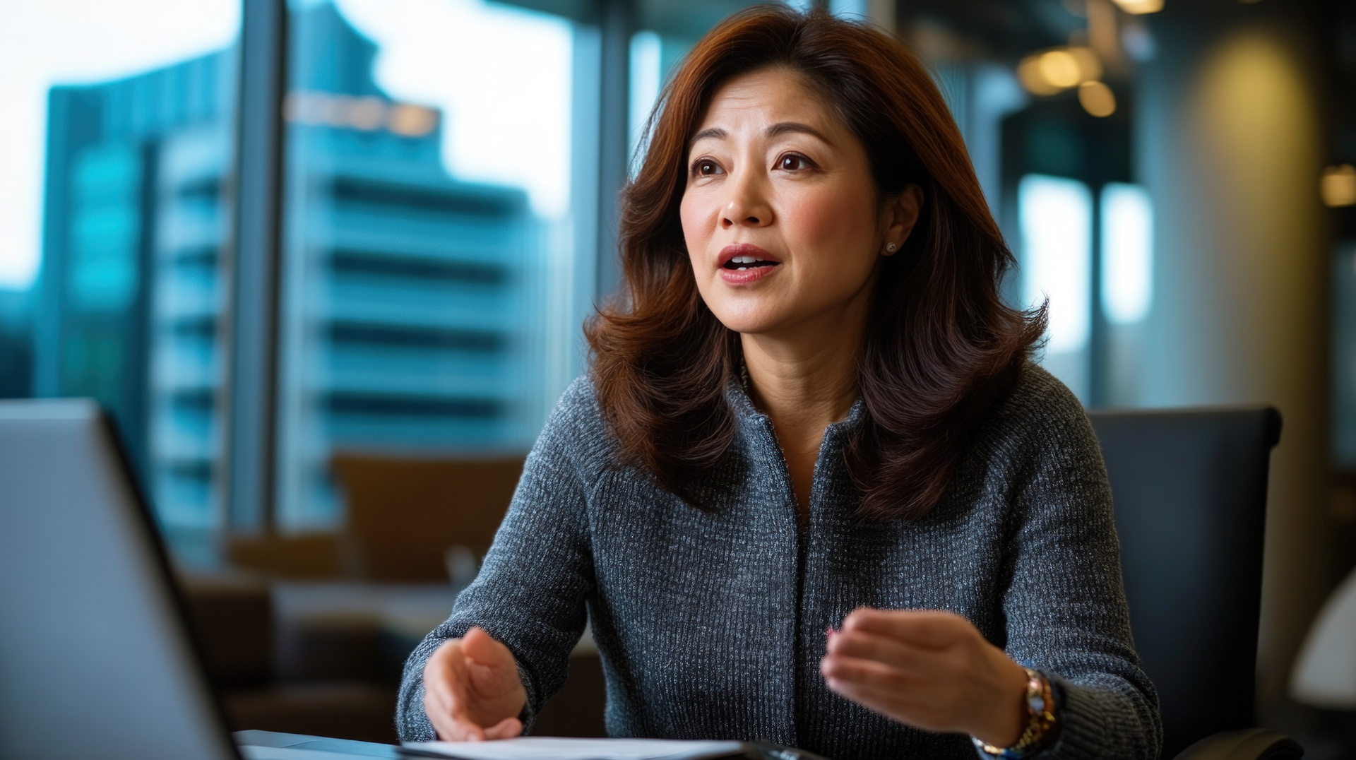 Professional businesswoman presenting wealth management strategies in Singapore office with city skyline view